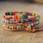 Preview: Handgefertigtes 7-Chakren Wickelarmband mit Herz in Edelstahlfassung